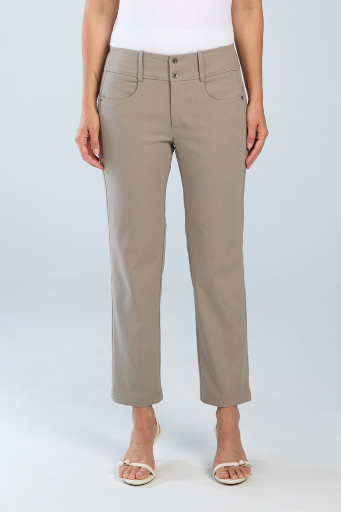 Beige pants worn by a person on a light blue background
