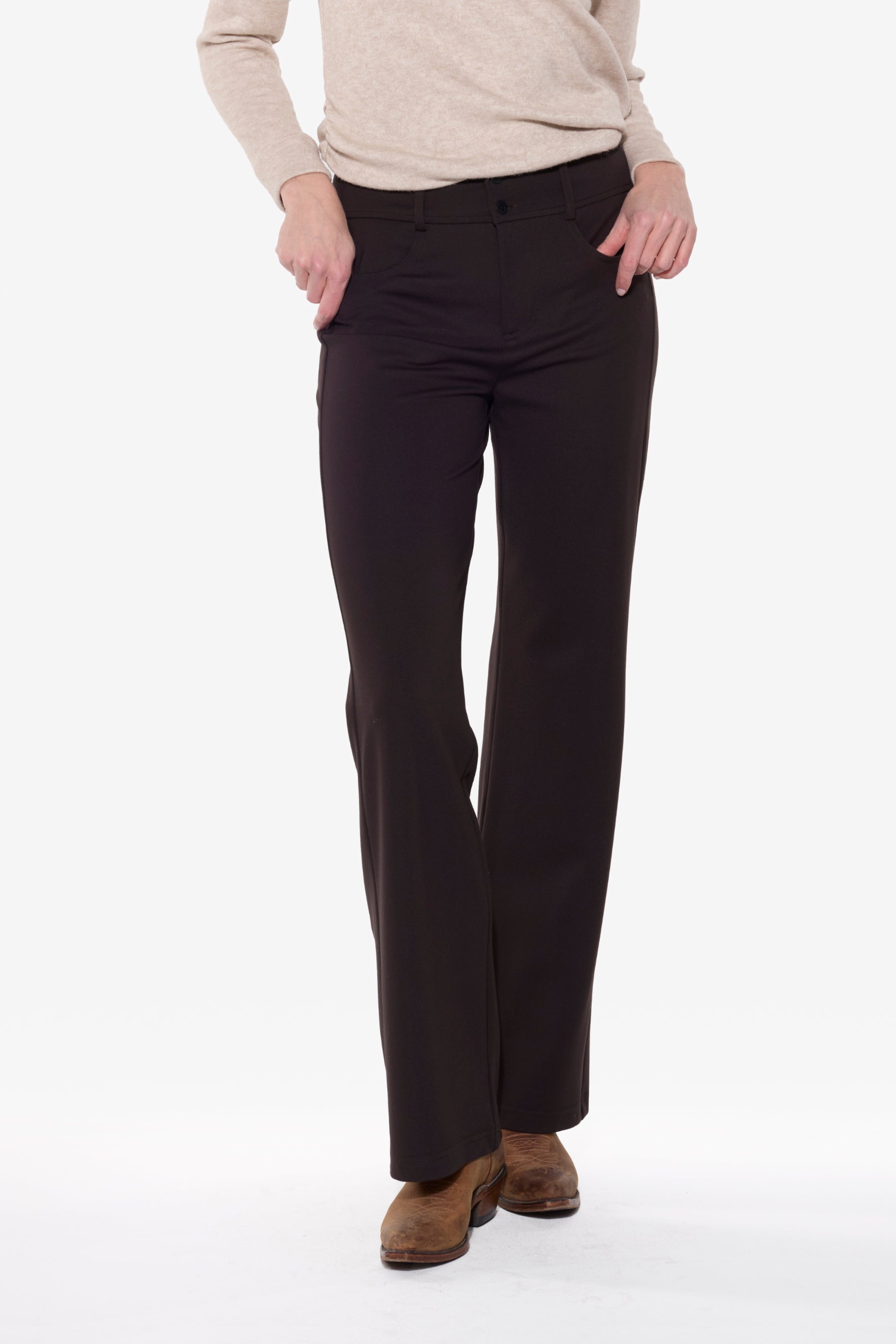 Person wearing brown pants on a white background