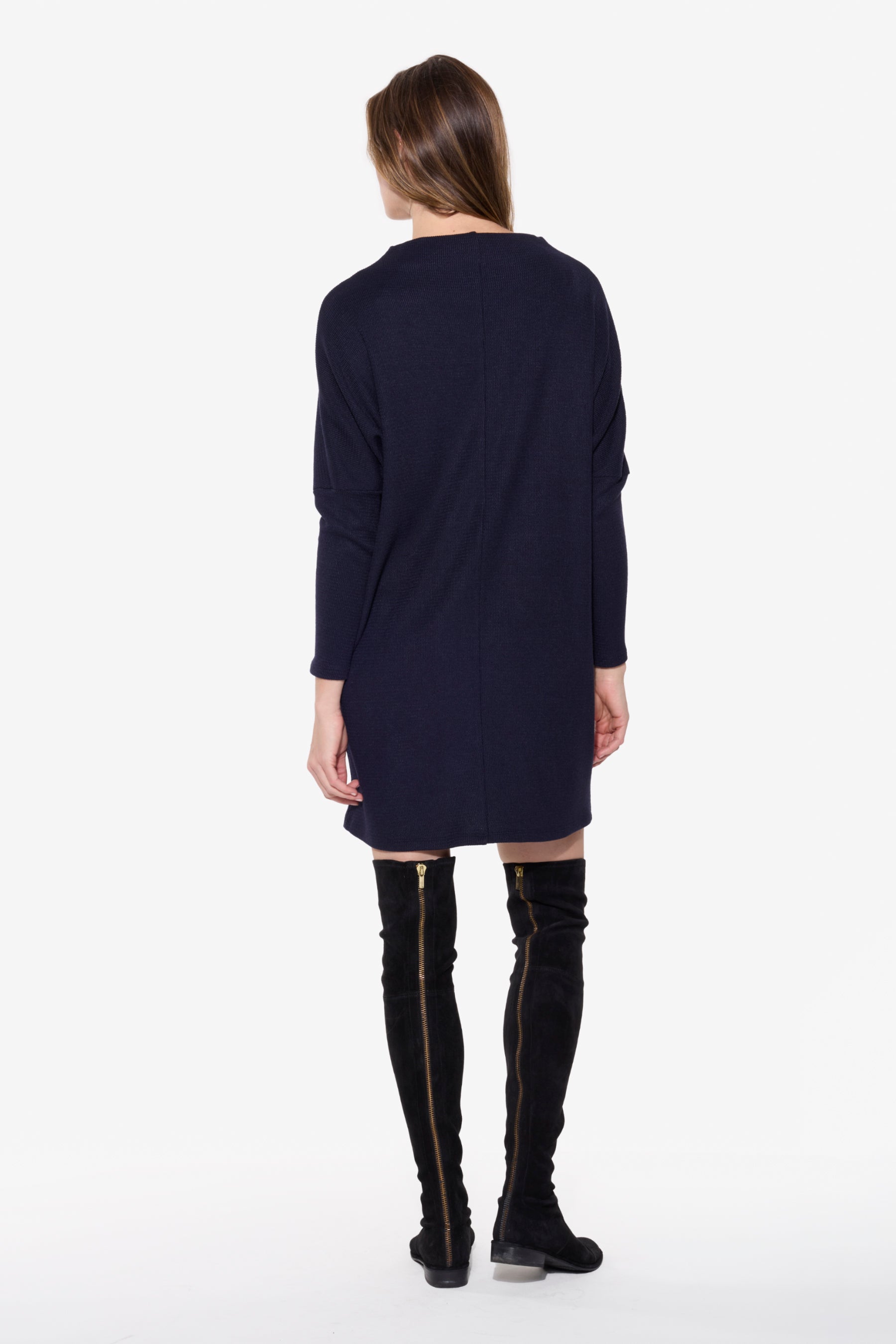 Back view of the BEDDOME Dolman Mock Neck Dress in Navy, featuring a relaxed silhouette, dolman sleeves, and soft mock neckline.