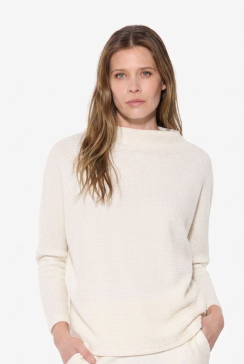 Model in Winter White Mock Neck Sweater