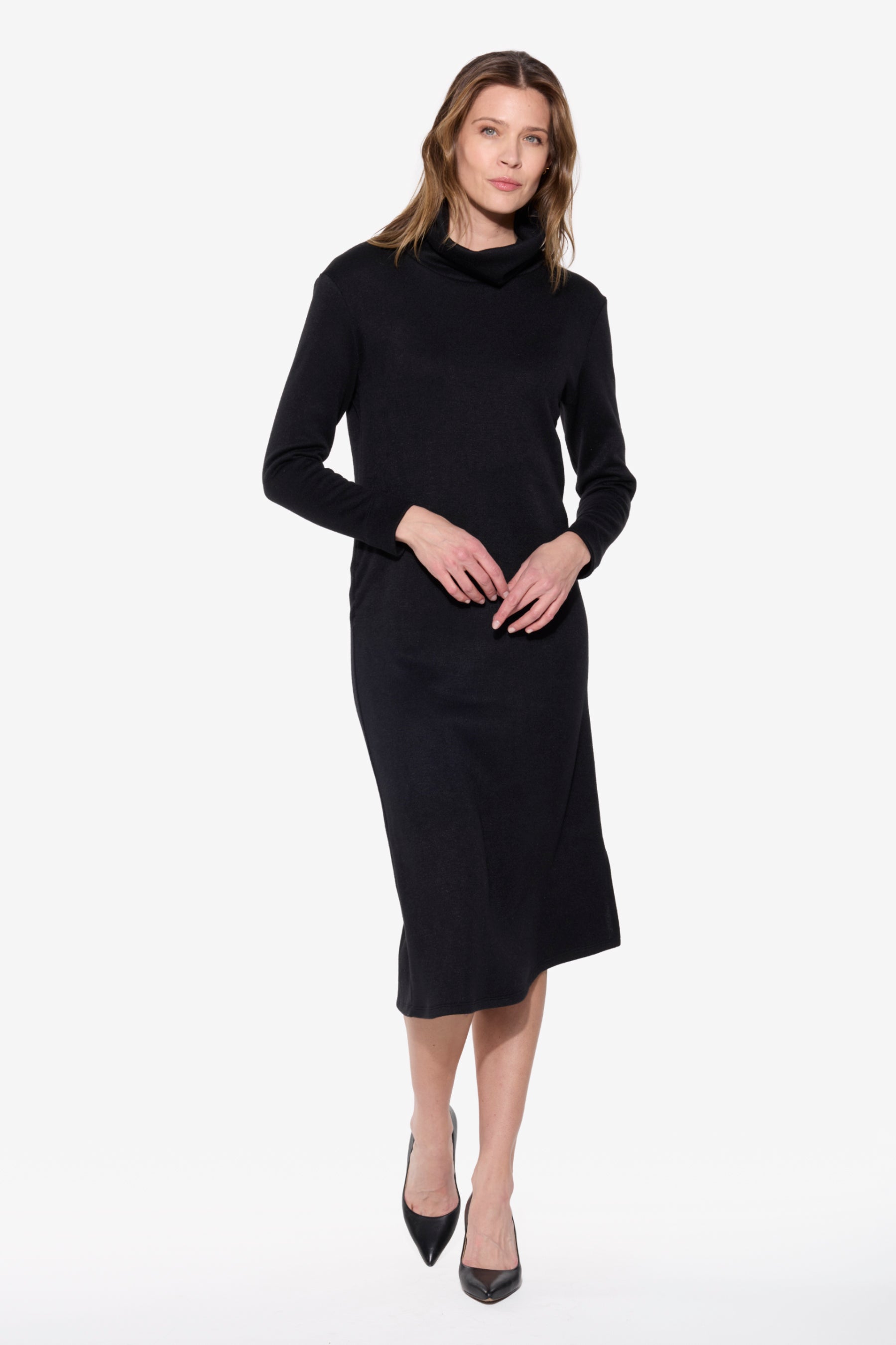 Woman wearing a black dress on a white background