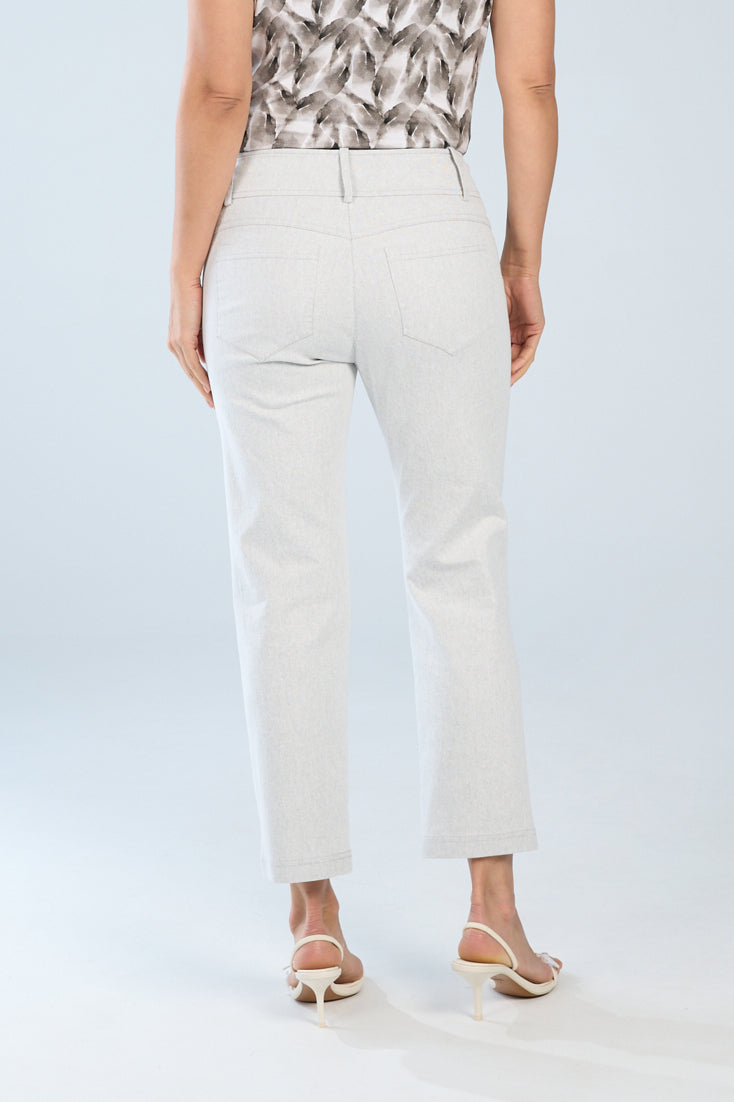 Woman wearing stone-wash crop straight-leg jeans with a mid-rise waist, classic back pockets, and cropped straight-leg fit, shown from the back.