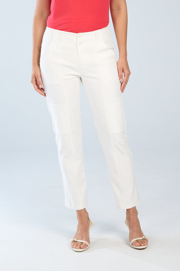 Woman wearing white stretch denim cropped cargo pants with a straight leg silhouette, front patch pockets, and button closure.