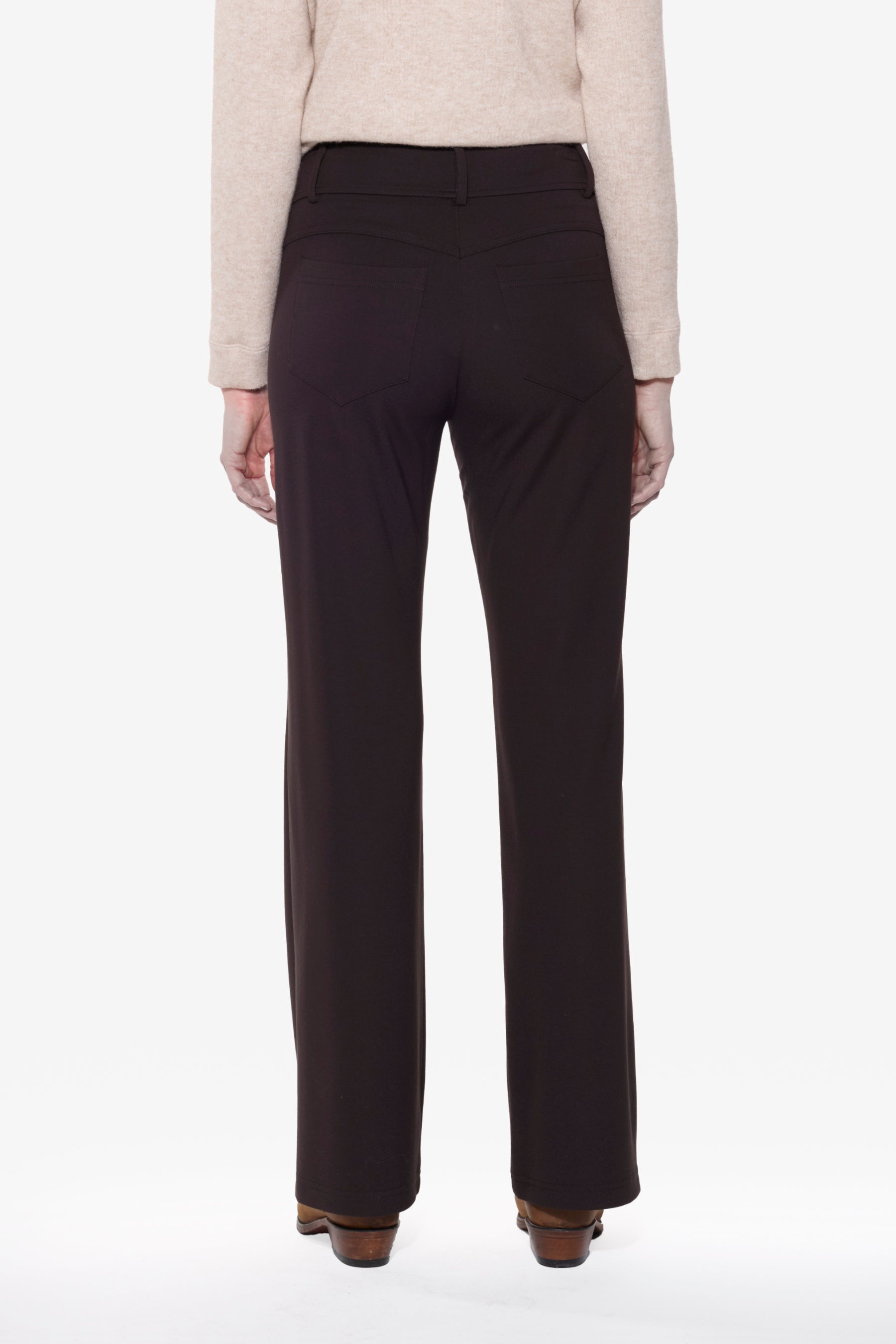 Back view of brown pants on a white background