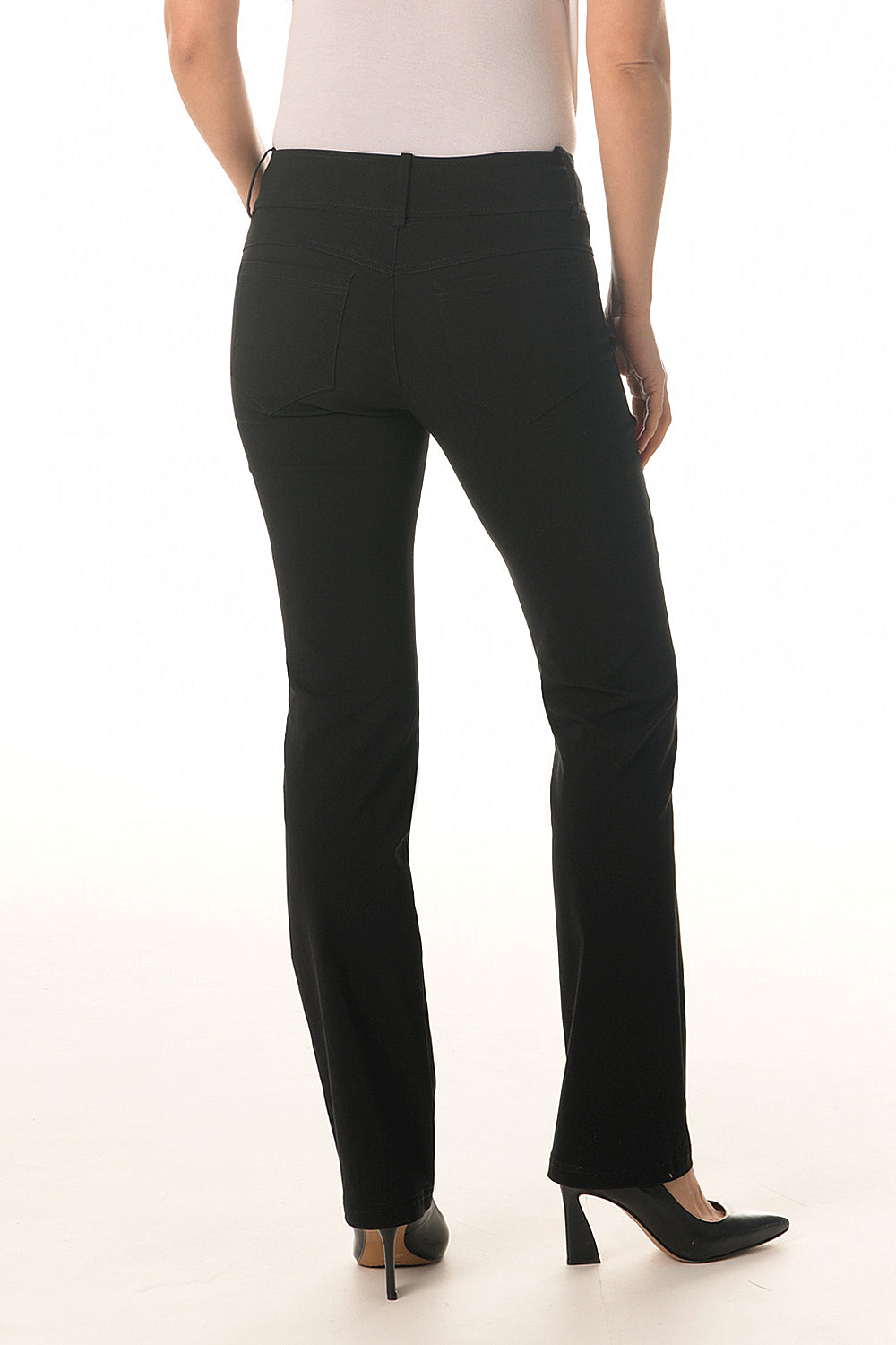 Black pants worn by a person on a white background
